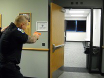 person training to enter a hostile room