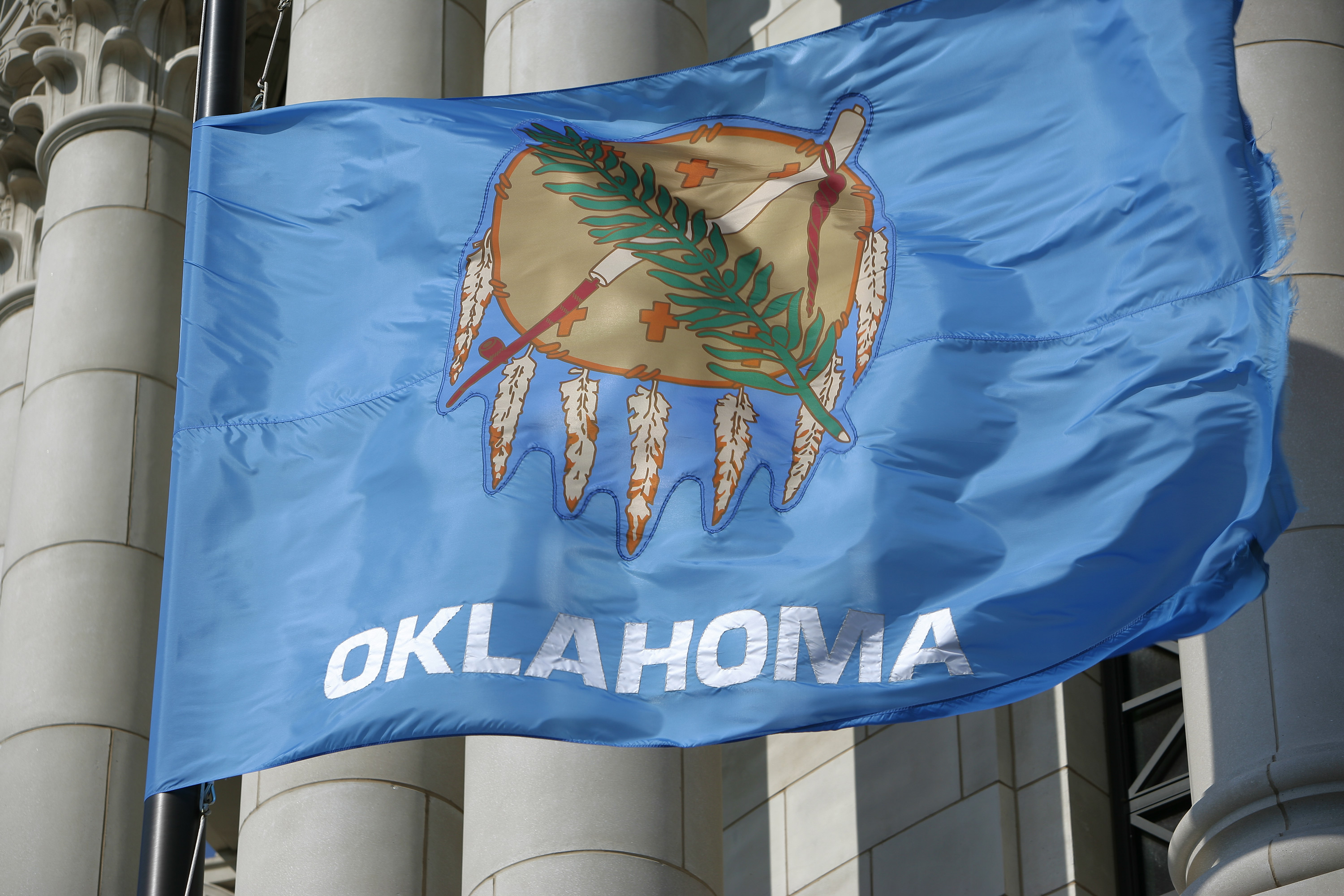 Oklahoma-flag-in-front-of-capitol