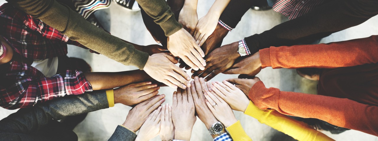 Homepage Banner, a Group of Diverse Hands Together Joining Concept