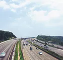 Cars driving on a highway.
