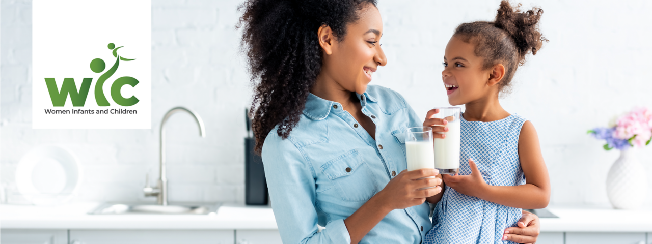 Woman and Child drinking milk with Oklahoma WIC logo