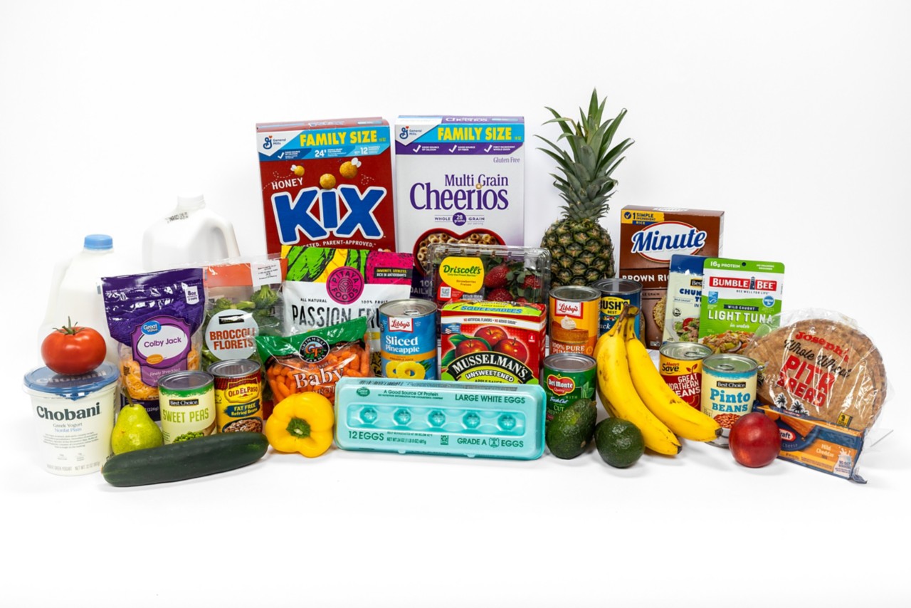 A selection of breakfast cereals, produce, canned foods and other foods is seen in this photo. 