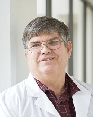 headshot of michael woods, M.D.