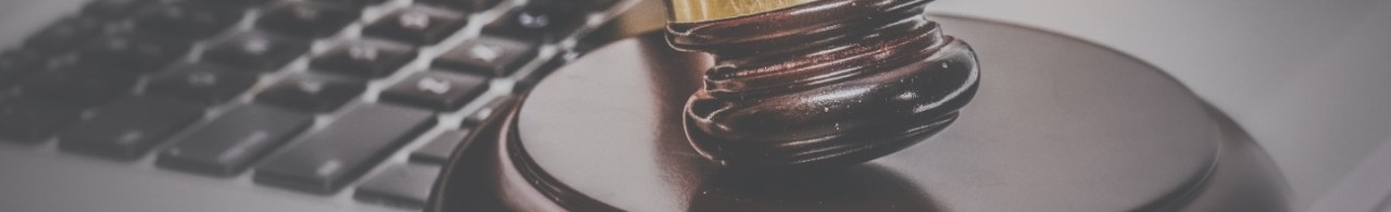 Gavel in front of keyboard