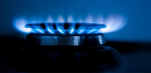 Stock image of a blue flame of a natural gas-burning stove