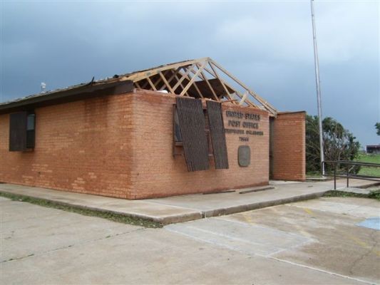 Post Office with damaged roof.