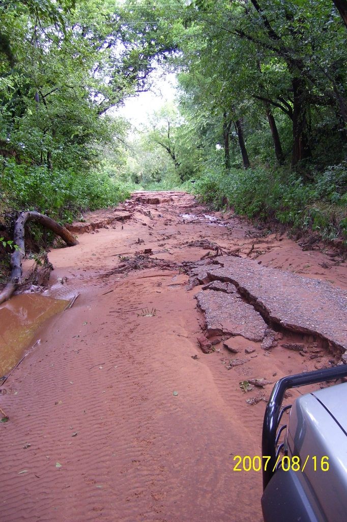 Flood damaged road.