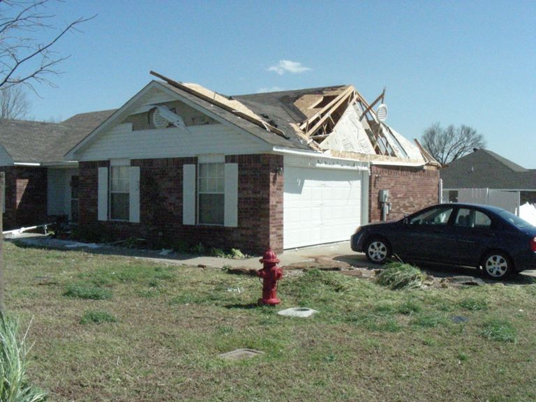 a house with roof damages.
