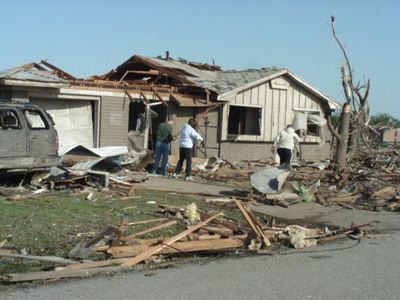 Home with roof damage from tornado