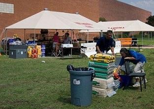Volunteers assist with pets at the Oklahoma City HurricaneGustav evacuation center.