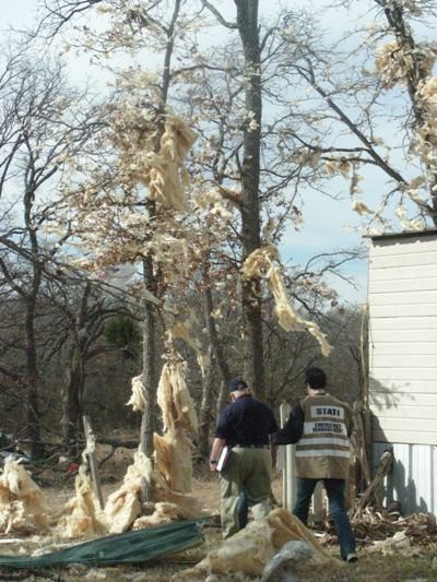 Officials survey Storm damage.