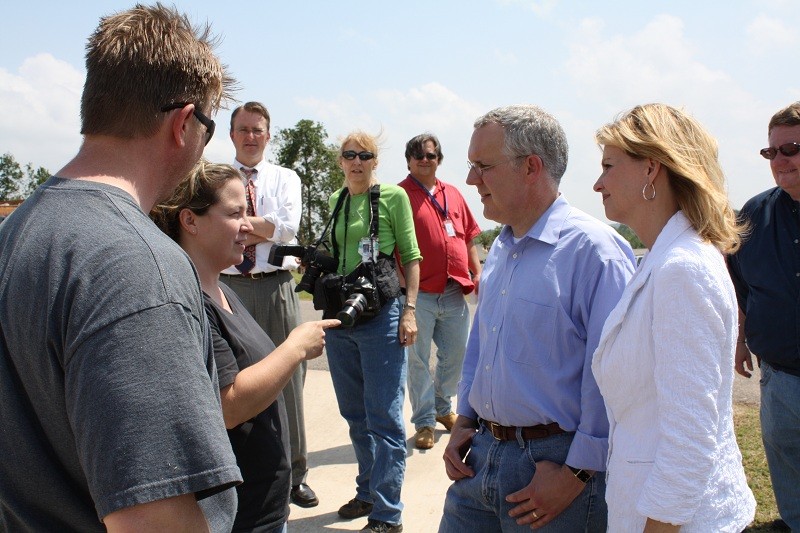Gov. Henry and his wife talk with storm survivors. 