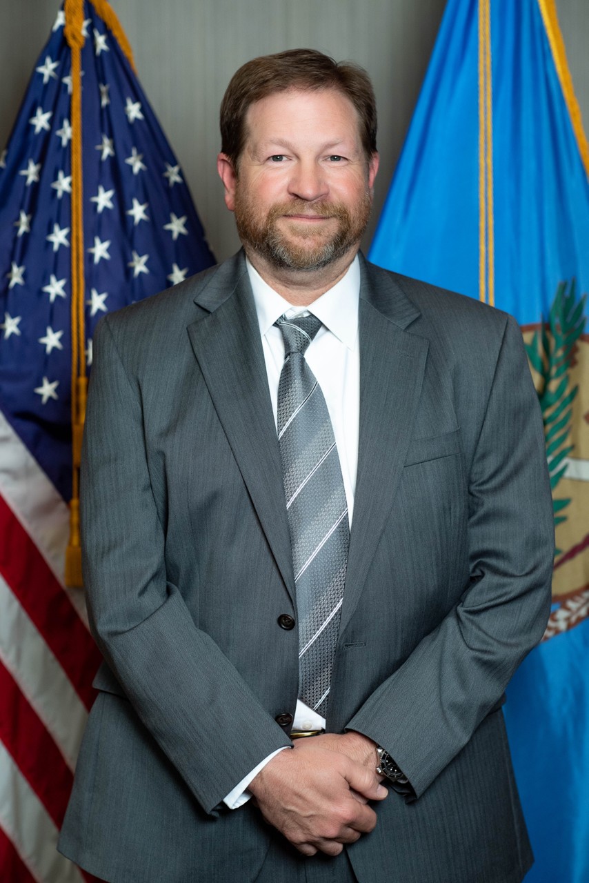 JOHN JONES Division Director, Investigative Services