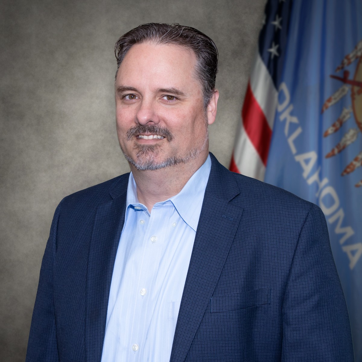 State headshot for Tab Pierce.