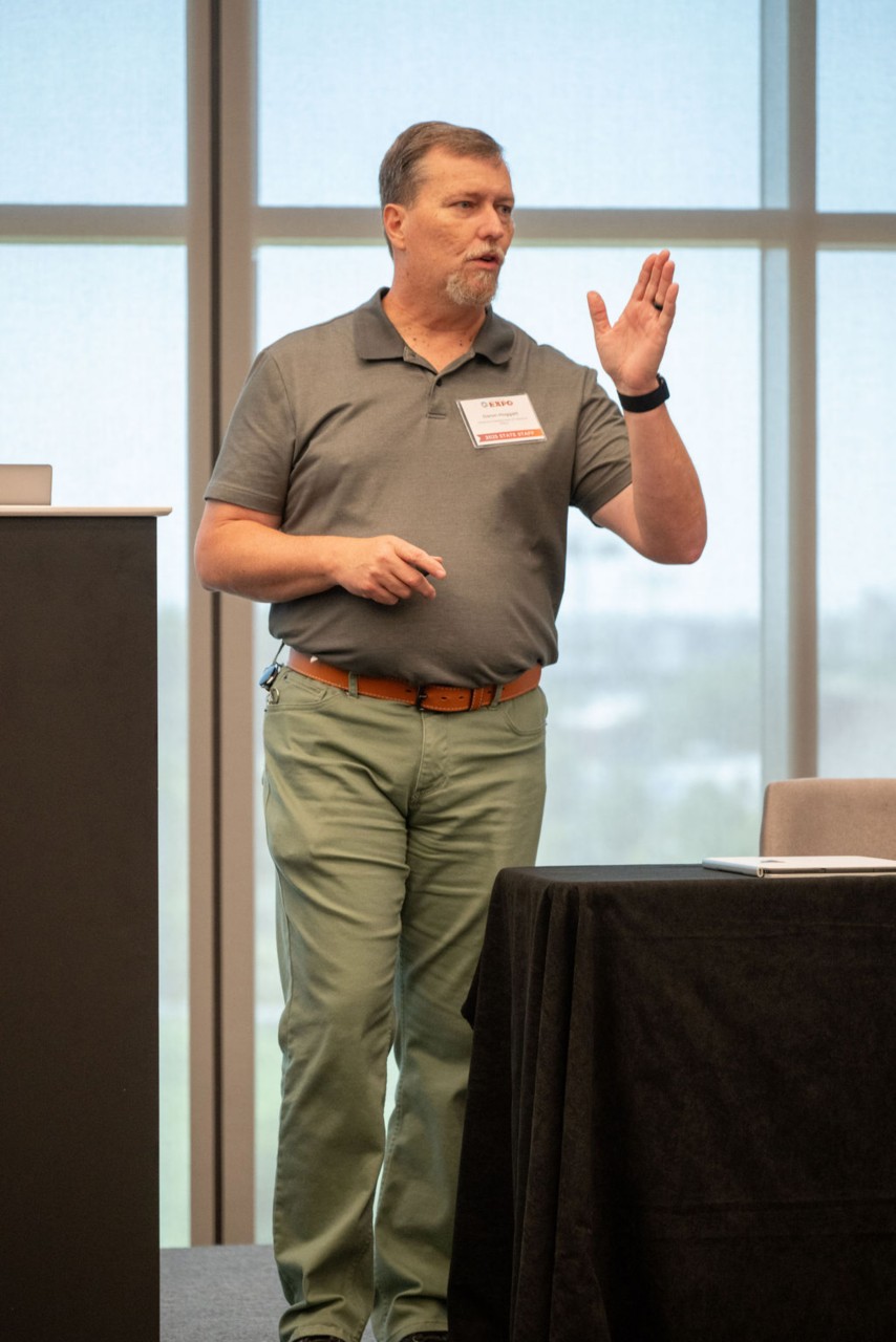 ODVA Public Information Officer Daron Hoggatt gestures while presenting during Veteran-owned Businesses breakout session