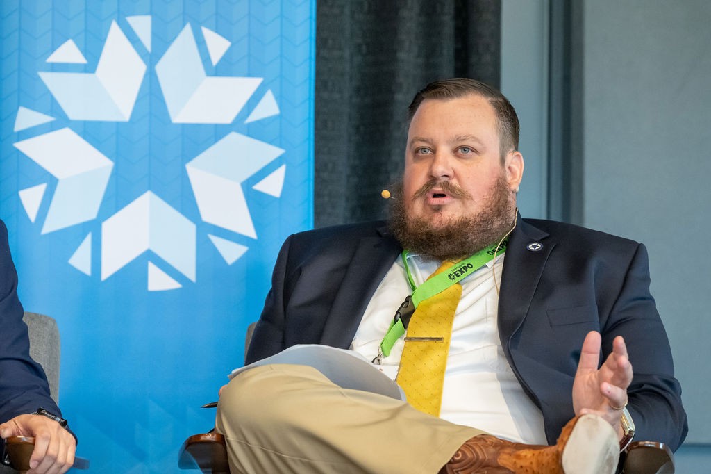 OMES Senior Manager of Process Innovation Blaine Birdges speaks during luncheon panel