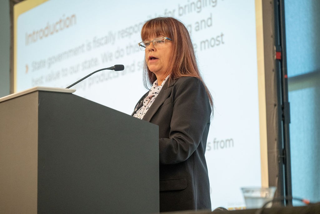 Close-up of OMES Category Manager Darlene Saltzman speaking at podium during Statewide Contract Opportunities breakout session