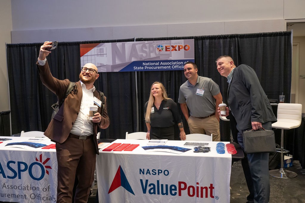 Supplier takes selfie at NASPO booth