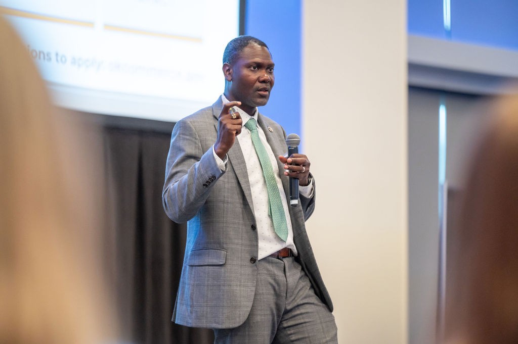 Midday speaker Aldwyn Sappleton gestures while speaking
