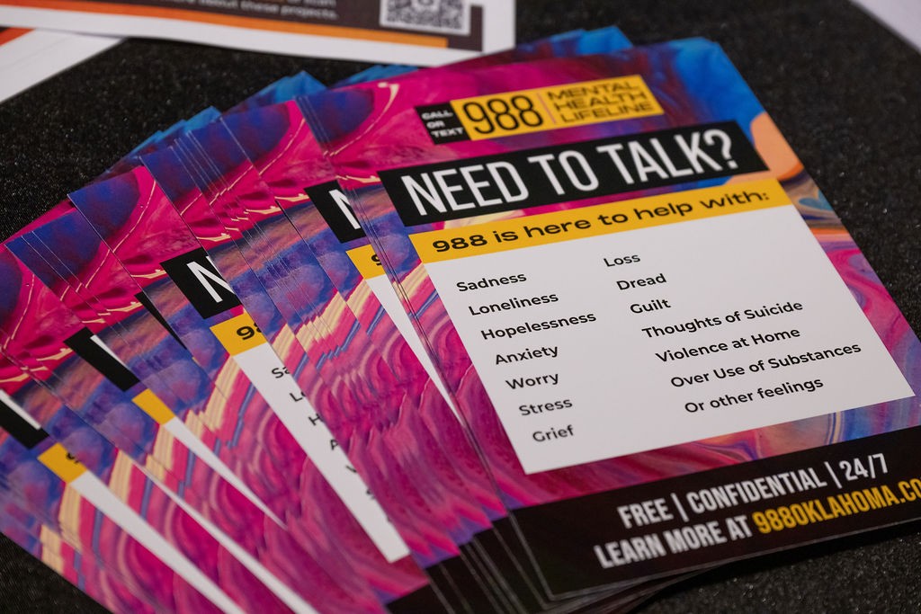 988 flyers at Health and Mental Health booth