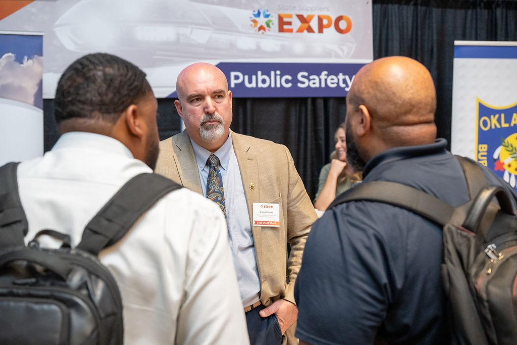 Public Safety booth staff interact with supplier attendees