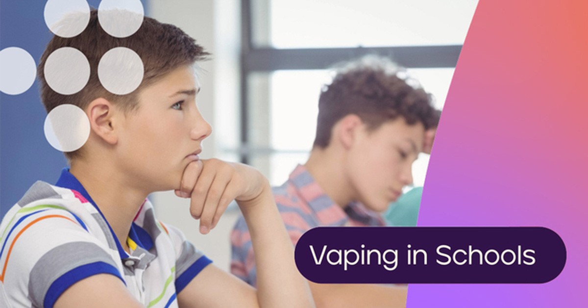 Two students in class with caption Vaping in School